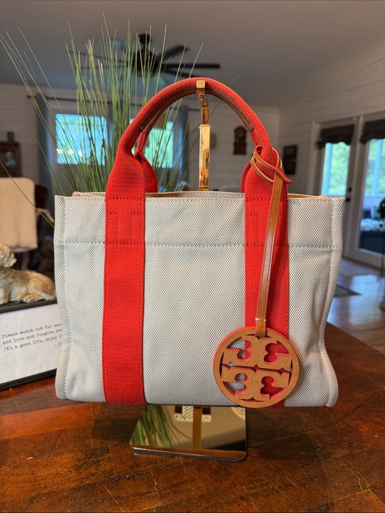 Tory Burch Handbags - Tory Burch Canvas Tote with Red Straps and oversized Charm
